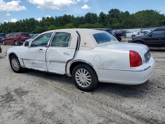 Photo 2 from auction – 2003 LINCOLN TOWN CAR E with VIN 1LNHM81W73Y604543