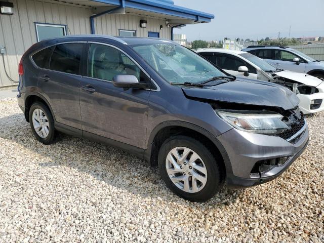 Photo 4 from auction – 2015 HONDA CR-V EXL with VIN 2HKRM4H74FH660011