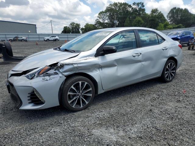 TOYOTA COROLLA L 2019 with VIN 5YFBURHE8KP861890 - Photo from auction