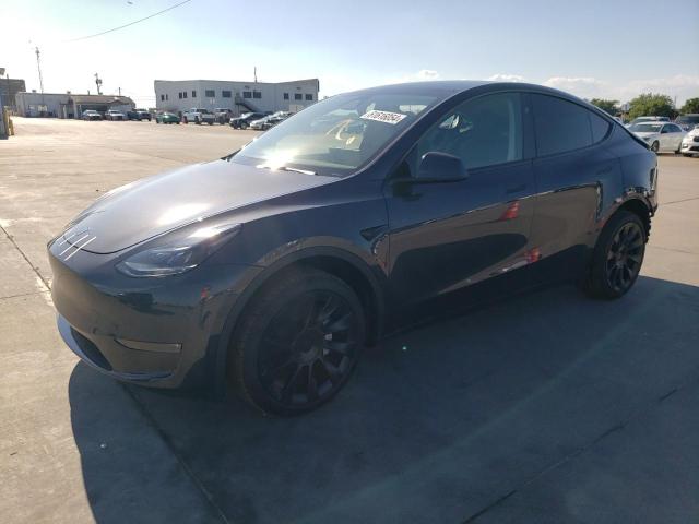TESLA MODEL Y 2024 with VIN 7SAYGDEE1RA294100 - Photo from auction