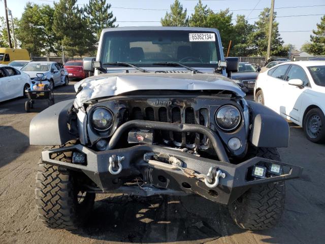 Photo 5 from auction – 2015 JEEP WRANGLER S with VIN 1C4AJWAG1FL696567