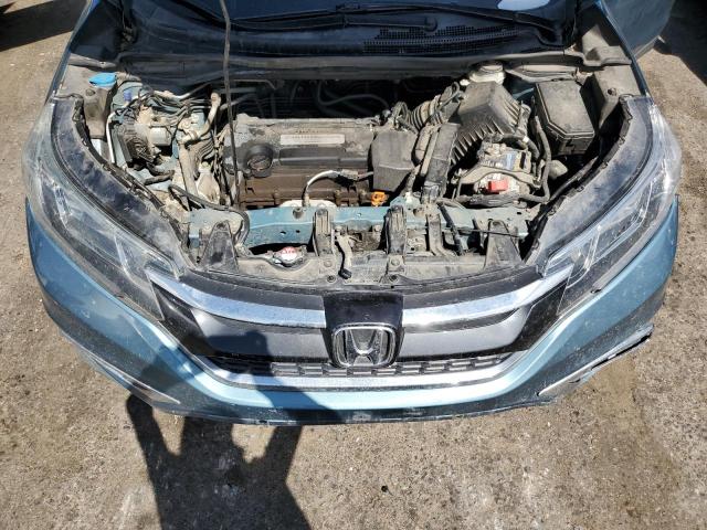 Photo 12 from auction – 2015 HONDA CR-V EXL with VIN 2HKRM4H76FH652671