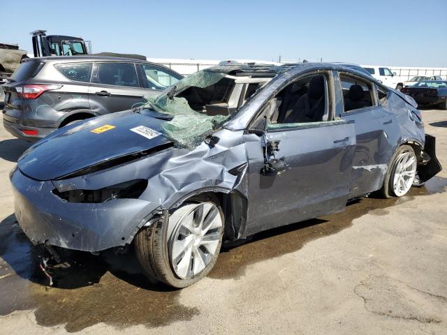TESLA MODEL Y 2022 with VIN 7SAYGDEE5NF553720 - Photo from auction