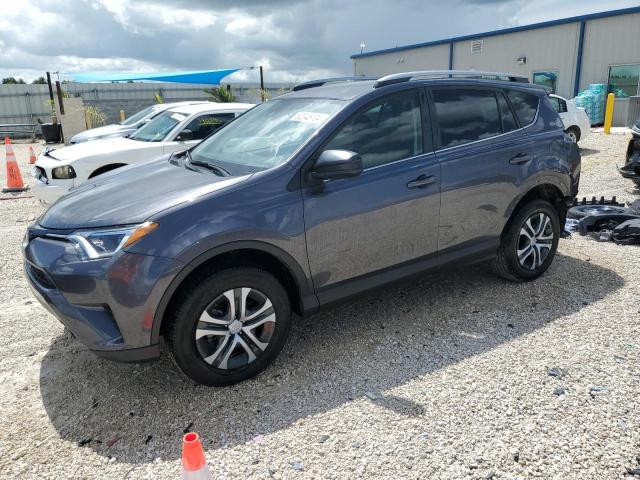 TOYOTA RAV4 LE 2018 with VIN JTMZFREV3JJ168628 - Photo from auction
