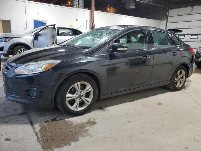 FORD FOCUS SE 2014 with VIN 1FADP3F21EL431997 - Photo from auction