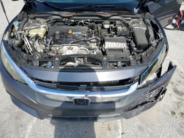 Photo 11 from auction – 2016 HONDA CIVIC LX with VIN 19XFC2F56GE048460