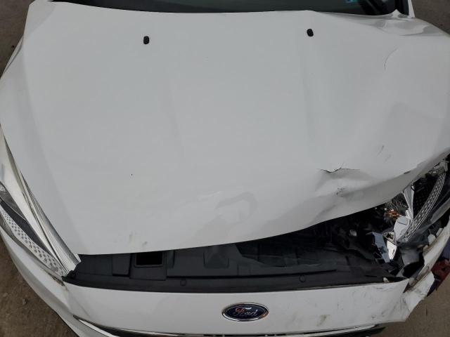 Photo 11 from auction – 2018 FORD FOCUS SE with VIN 1FADP3F27JL234004
