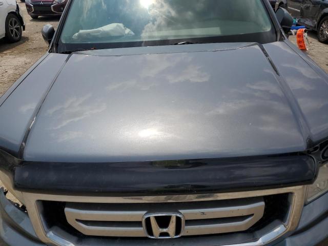 Photo 11 from auction – 2011 HONDA RIDGELINE with VIN 5FPYK1F51BB001692