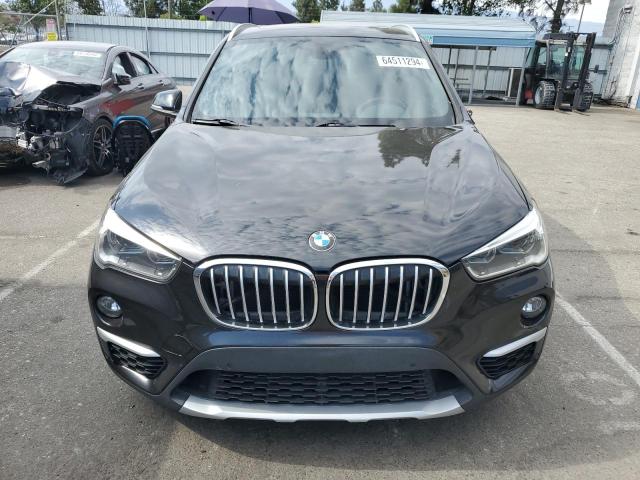 Photo 5 from auction – 2017 BMW X1 XDRIVE2 with VIN WBXHT3C34H5F69133