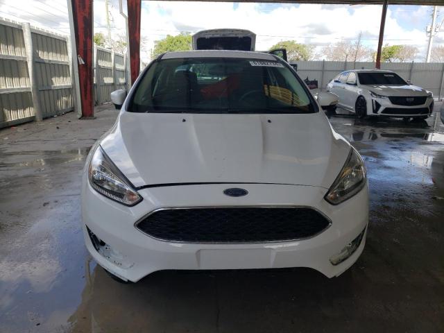 Photo 5 from auction – 2016 FORD FOCUS SE with VIN 1FADP3F24GL376917