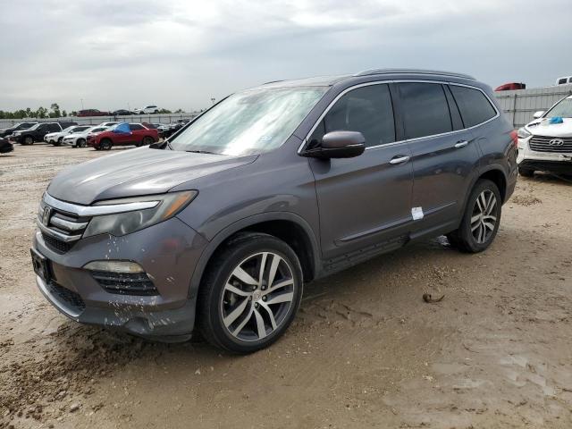 HONDA PILOT ELIT 2017 with VIN 5FNYF6H02HB028419 - Photo from auction