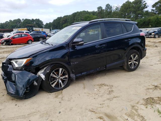 TOYOTA RAV4 XLE 2017 with VIN JTMRFREV1HD216569 - Photo from auction