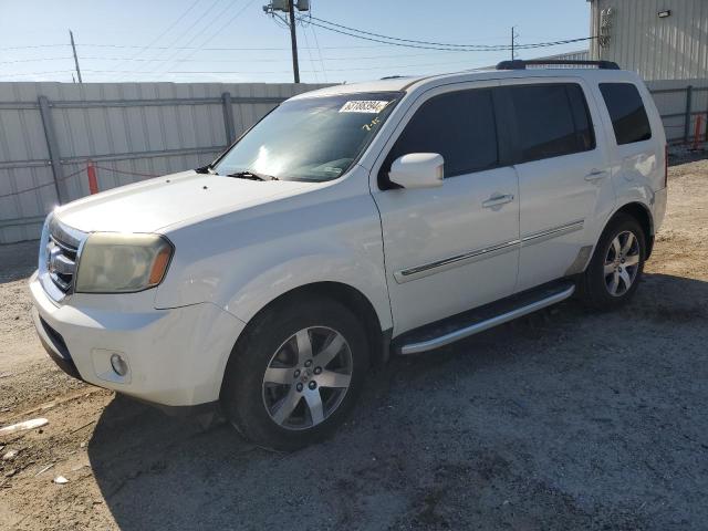 HONDA PILOT TOUR 2011 with VIN 5FNYF3H90BB003636 - Photo from auction