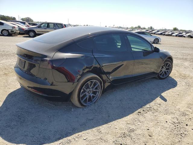 Photo 3 from auction – 2022 TESLA MODEL 3 with VIN 5YJ3E1EA1NF320085