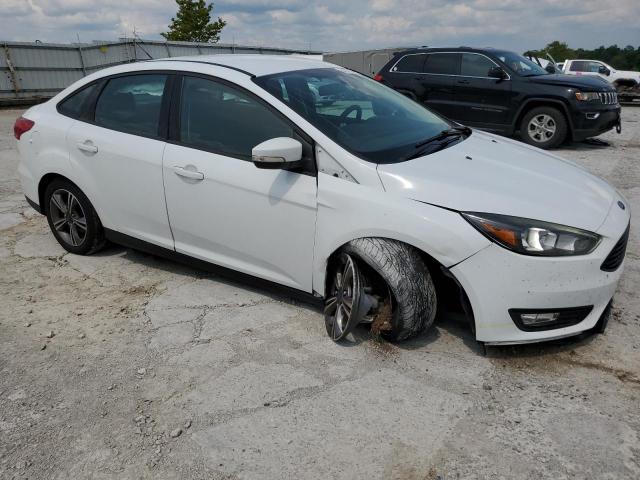 Photo 4 from auction – 2017 FORD FOCUS SE with VIN 1FADP3FE9HL309600