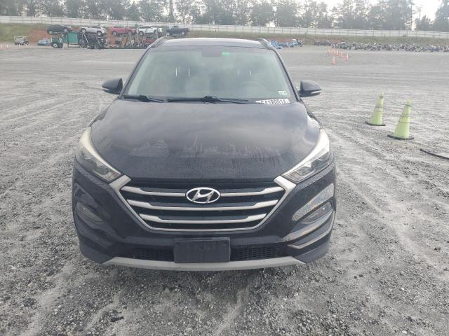 Photo 5 from auction – 2017 HYUNDAI TUCSON LIM with VIN KM8J3CA24HU566160