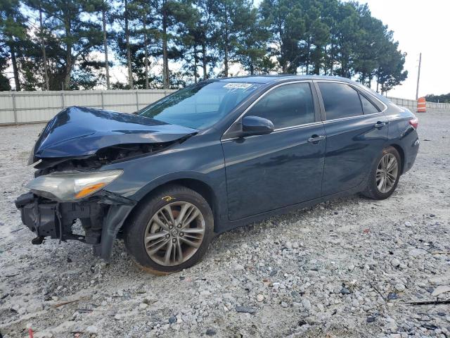 TOYOTA CAMRY LE 2016 with VIN 4T1BF1FKXGU261513 - Photo from auction