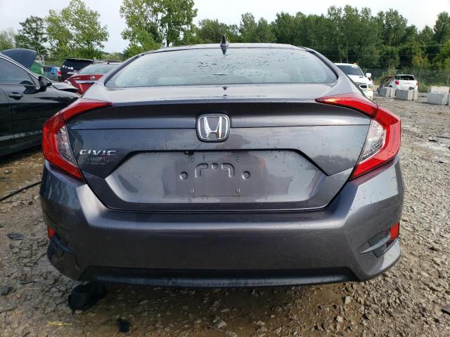 Photo 6 from auction – 2018 HONDA CIVIC EX with VIN 19XFC2F77JE040957