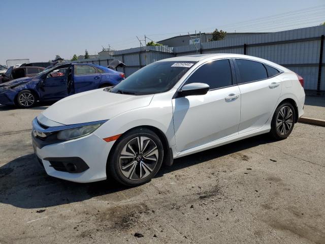 HONDA CIVIC EX 2017 with VIN 19XFC1F3XHE201268 - Photo from auction