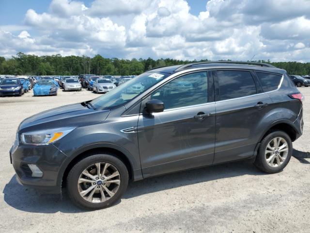 FORD ESCAPE SE 2018 with VIN 1FMCU0GDXJUC88917 - Photo from auction