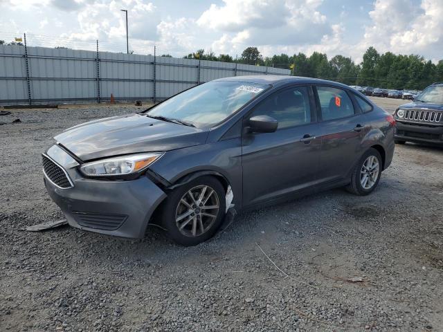 FORD FOCUS SE 2018 with VIN 1FADP3F20JL284646 - Photo from auction