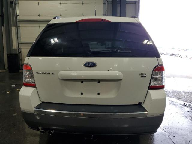 Photo 6 from auction – 2008 FORD TAURUS X S with VIN 1FMDK05W58GA12877