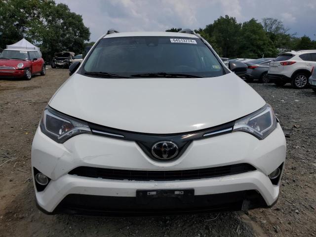 Photo 5 from auction – 2018 TOYOTA RAV4 LE with VIN JTMBFREV0JJ197649