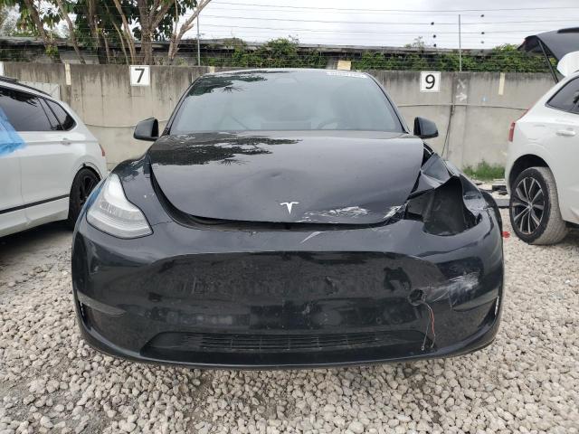 Photo 5 from auction – 2021 TESLA MODEL Y with VIN 5YJYGDEE9MF063972