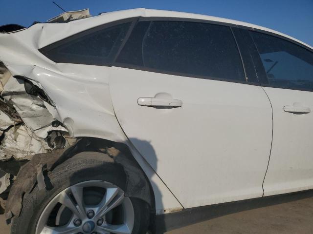Photo 10 from auction – 2013 FORD FOCUS SE with VIN 1FADP3F24DL190953