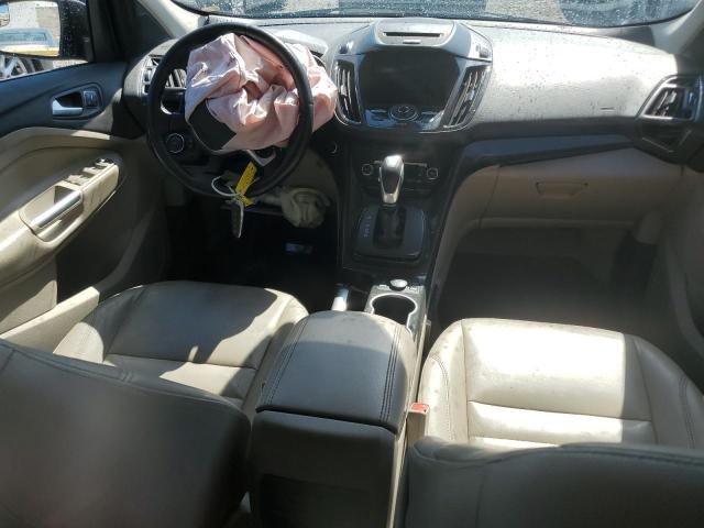 Photo 8 from auction – 2015 FORD ESCAPE TIT with VIN 1FMCU0J90FUA69055