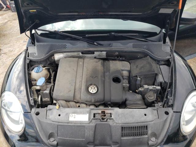 Photo 11 from auction – 2014 VOLKSWAGEN BEETLE with VIN 3VWFP7AT1EM621661