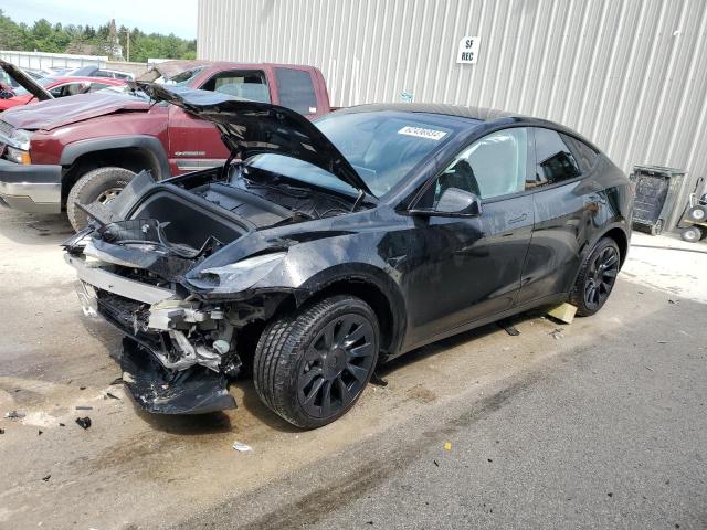 TESLA MODEL Y 2023 with VIN 7SAYGDEE5PF828229 - Photo from auction