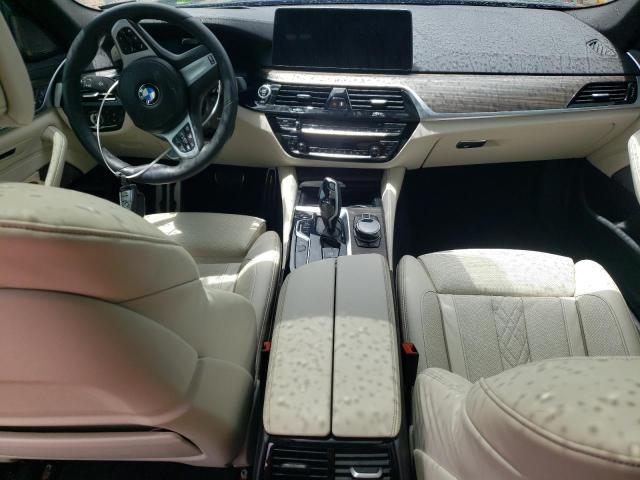 Photo 8 from auction – 2021 BMW M550XI with VIN WBA13BK06MCF38002