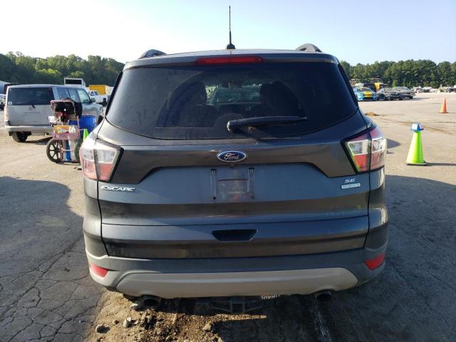 Photo 6 from auction – 2018 FORD ESCAPE SE with VIN 1FMCU0GD8JUC94392