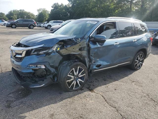 Photo 1 from auction – 2021 HONDA PILOT TOUR with VIN 5FNYF5H98MB025947