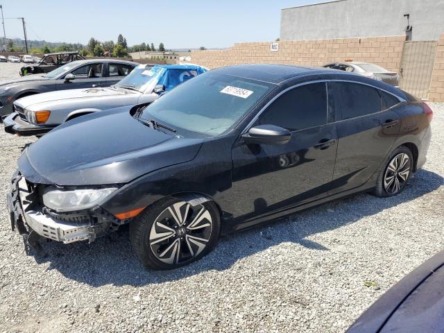HONDA CIVIC EXL 2018 with VIN JHMFC1F76JX006338 - Photo from auction