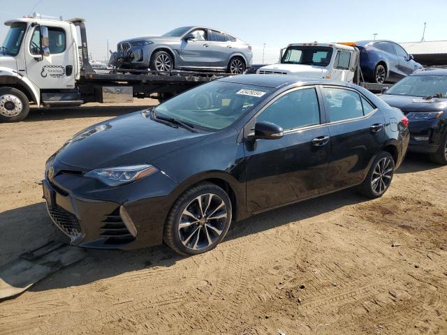 TOYOTA COROLLA L 2019 with VIN 5YFBURHE6KP872838 - Photo from auction