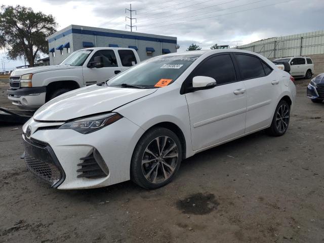 TOYOTA COROLLA L 2019 with VIN 2T1BURHE2KC191334 - Photo from auction