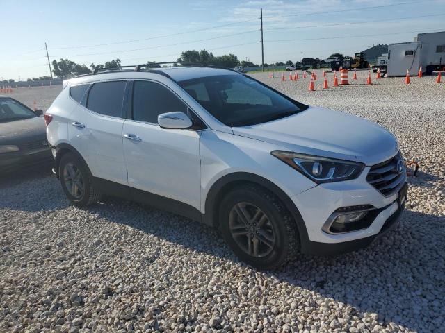 Photo 4 from auction – 2017 HYUNDAI SANTA FE S with VIN 5NMZU3LB2HH002242