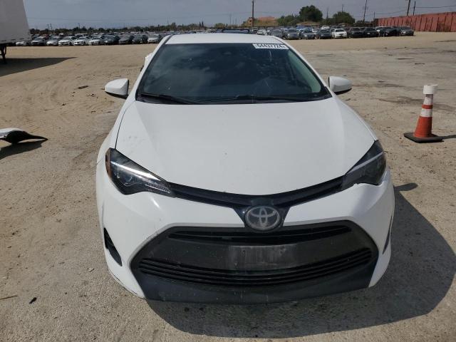 Photo 5 from auction – 2018 TOYOTA COROLLA L with VIN 5YFBURHEXJP804900
