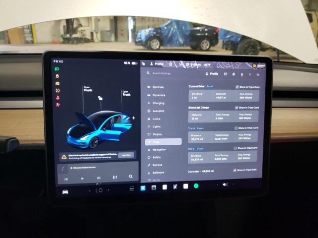 Photo 9 from auction – 2021 TESLA MODEL 3 with VIN 5YJ3E1EA4MF867351