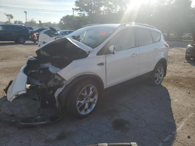 FORD ESCAPE TIT 2016 with VIN 1FMCU0J91GUC36914 - Photo from auction