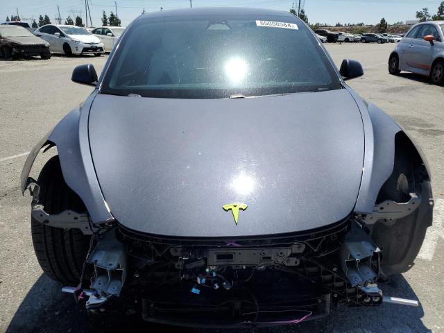 Photo 11 from auction – 2021 TESLA MODEL 3 with VIN 5YJ3E1EC9MF995697