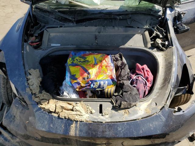 Photo 11 from auction – 2022 TESLA MODEL Y with VIN 7SAYGDEE5NF553720