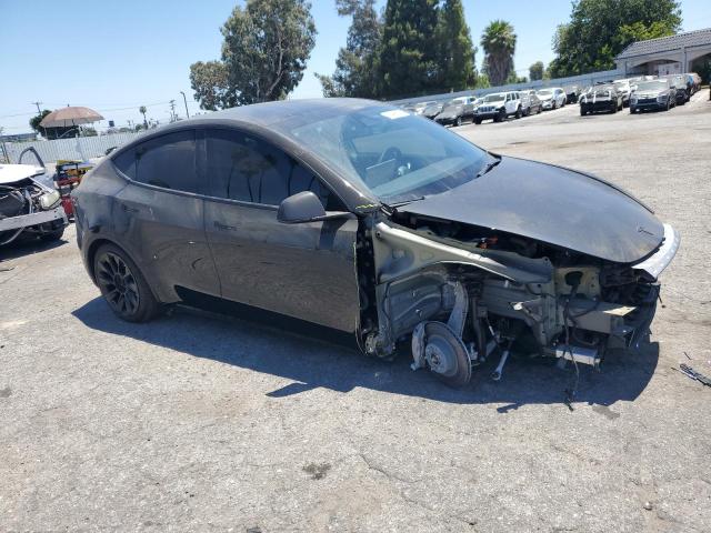 Photo 4 from auction – 2023 TESLA MODEL Y with VIN 7SAYGDEE0PF815548