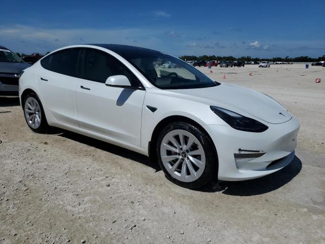Photo 4 from auction – 2023 TESLA MODEL 3 with VIN 5YJ3E1EB2PF632282
