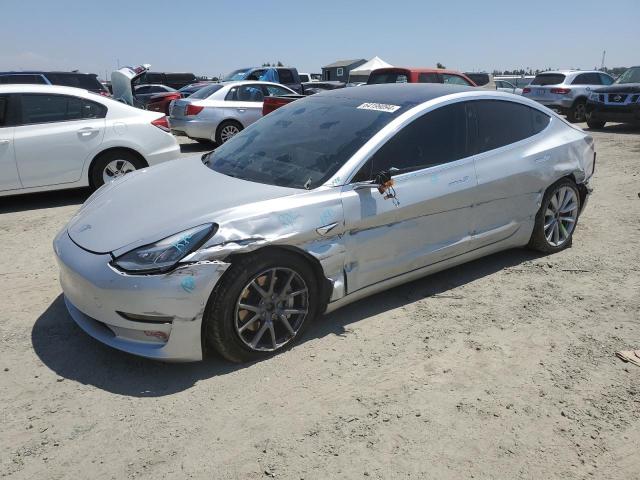 TESLA MODEL 3 2018 with VIN 5YJ3E1EB9JF065303 - Photo from auction