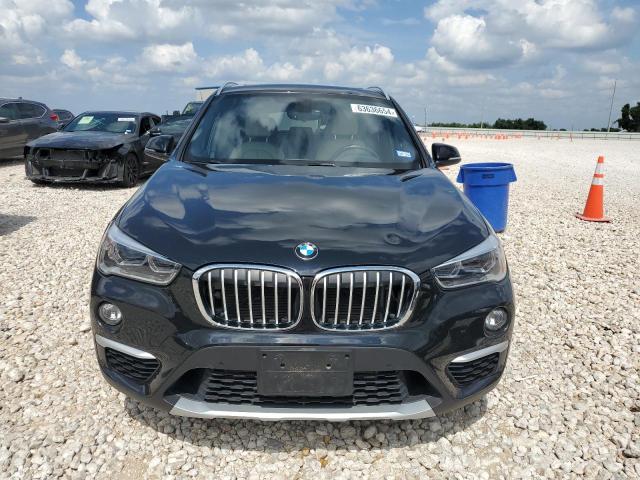 Photo 5 from auction – 2017 BMW X1 XDRIVE2 with VIN WBXHT3C36H5F70414