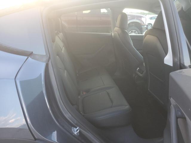 Photo 11 from auction – 2022 TESLA MODEL Y with VIN 7SAYGDEF5NF494614