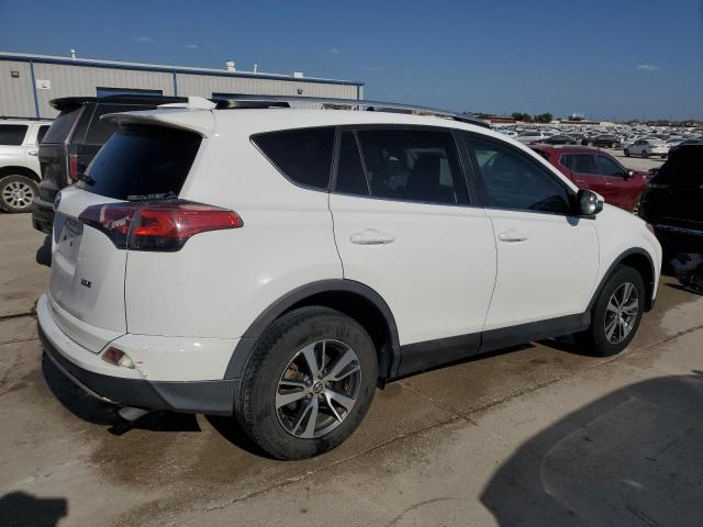 Photo 3 from auction – 2016 TOYOTA RAV4 XLE with VIN 2T3WFREVXGW253558